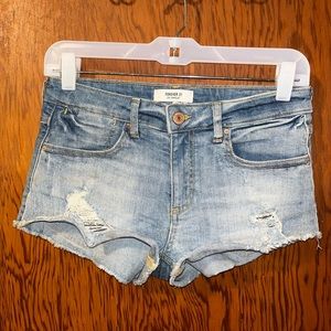 Distressed denim shorts